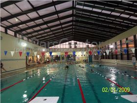 Public swimming pool cover - پوشش استخر شنای عمومی