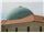 نمای شینگل مدرن با رویه مس اکسیده در سقف و نما