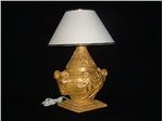 Cow with golden glazed earthenware lamp design