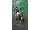 Coupled cow milking machine